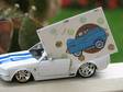 This fun polka dot gift card with embossed blue car sticker
